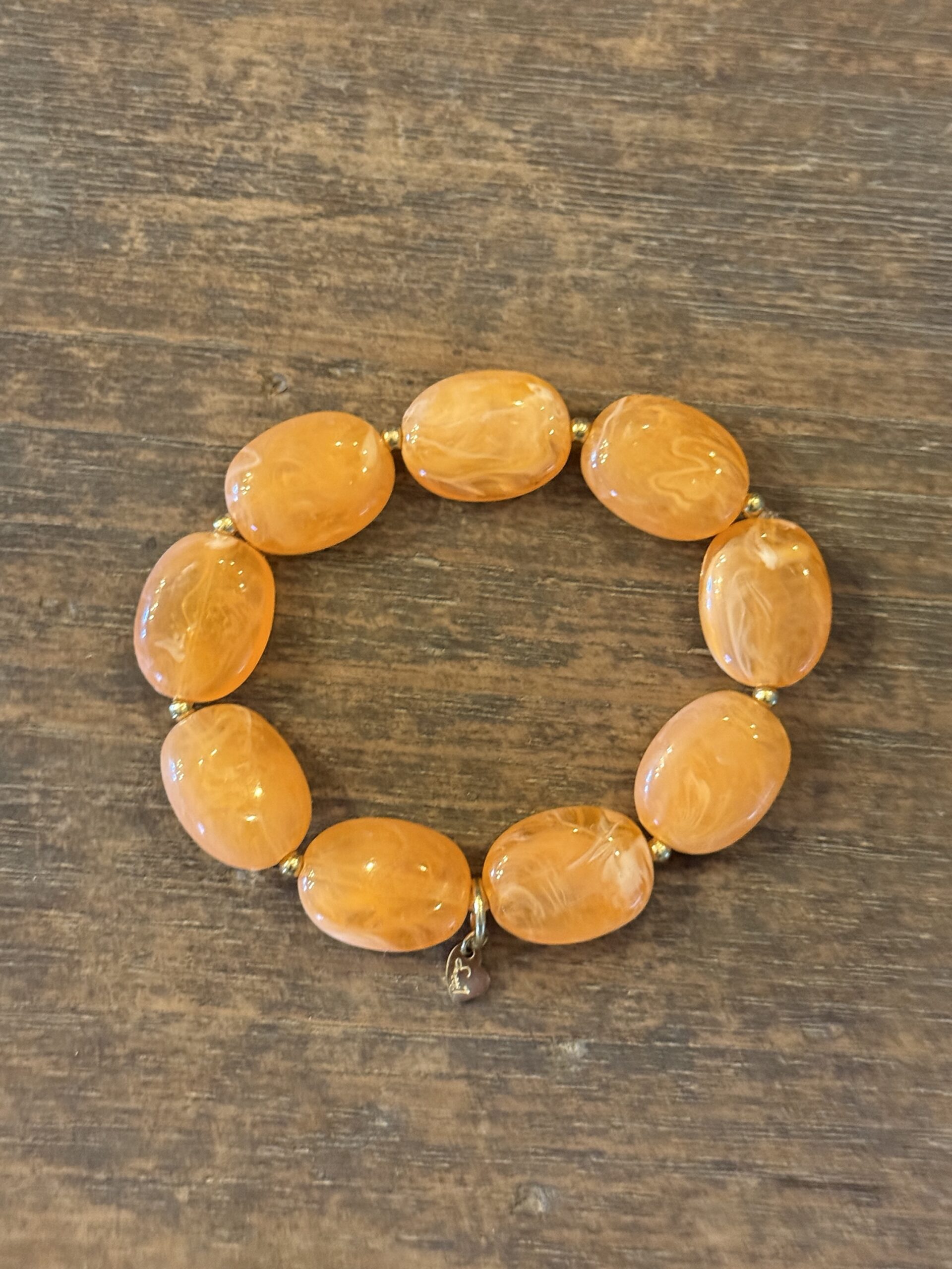 Oranje kralenketting met goudkleurige accenten - Afbeelding 2